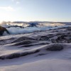 Sonnenaufgang über dem Nebelmeer auf einem verschneiten Gipfel, Jahresrückblick 2017