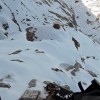 Verschneites Felsgelände mit Handschuh, Alpstein