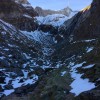 Hochtal mit Schneeresten unter Felswänden, Alpstein