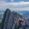 Kletterer an einem Kreuzberg-Turm, Alpstein
