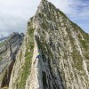 Steiler Felsgipfel mit Kletterer, Alpstein